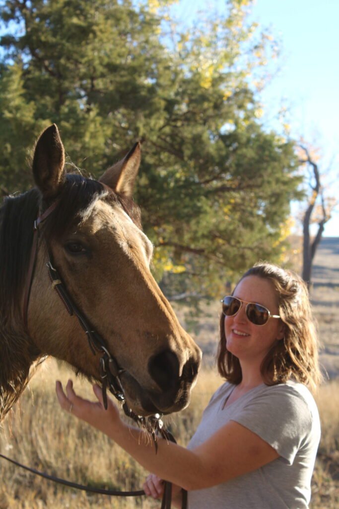 A young woman and her horse.